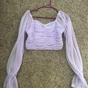 Purple / Lilac top. Sheer sleeves. Zip up back. So cute!